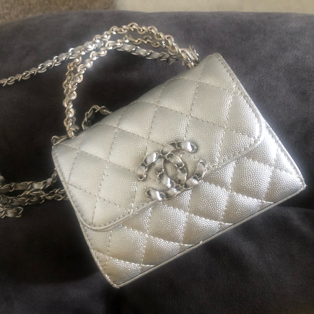 Small silver Chanel purse with Box and tag included
